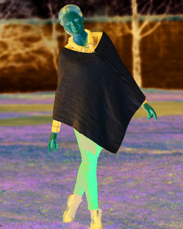 Beskrivning Poncho med dragkedja